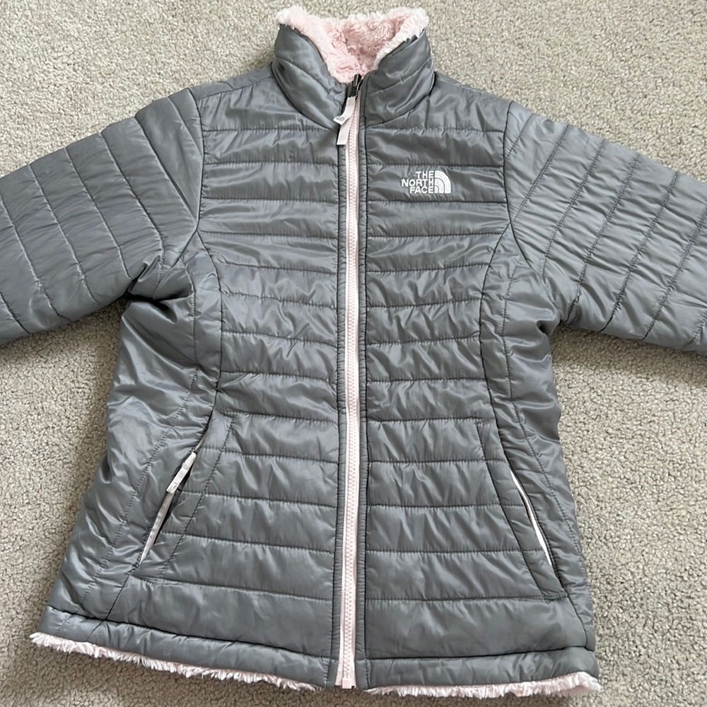 Reversible grey/pink north face jacket.